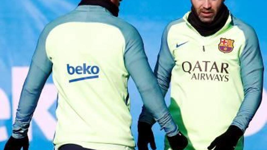 Messi i Iniesta, durant l&#039;entrenament d&#039;ahir.