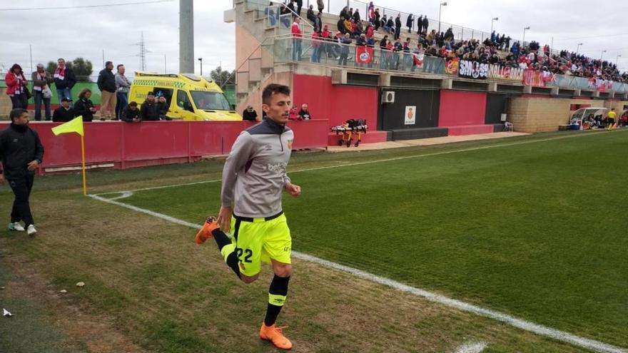 Budimir, calentando antes de entrar en el partido.