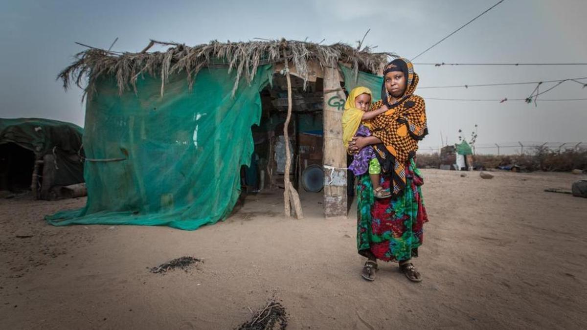 Un madre junto a su hija, en Somalia
