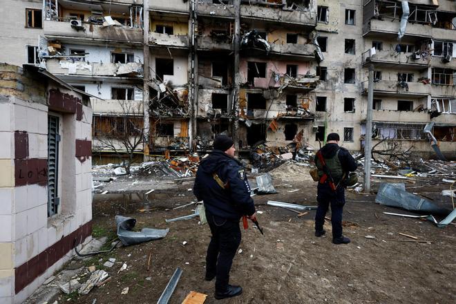 A residential building is damaged, after Russia launched a massive military operation against Ukraine, in Kyiv