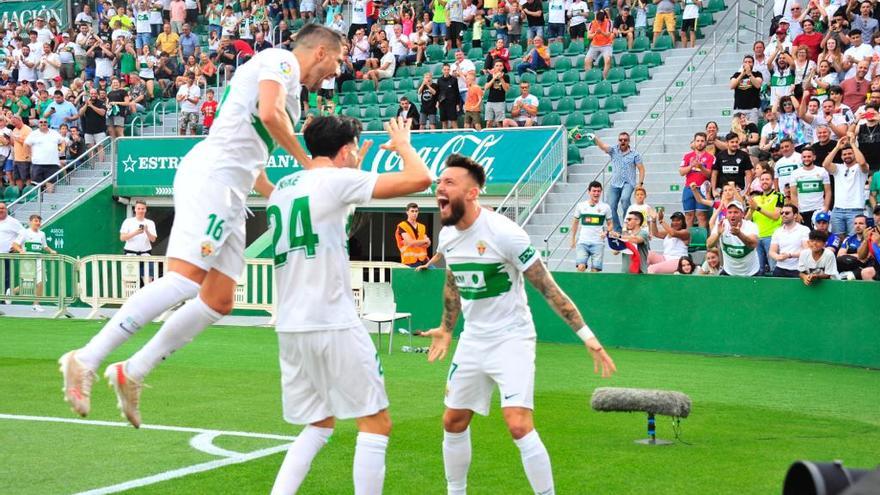 Josan, Kike y Fidel celebran un gol