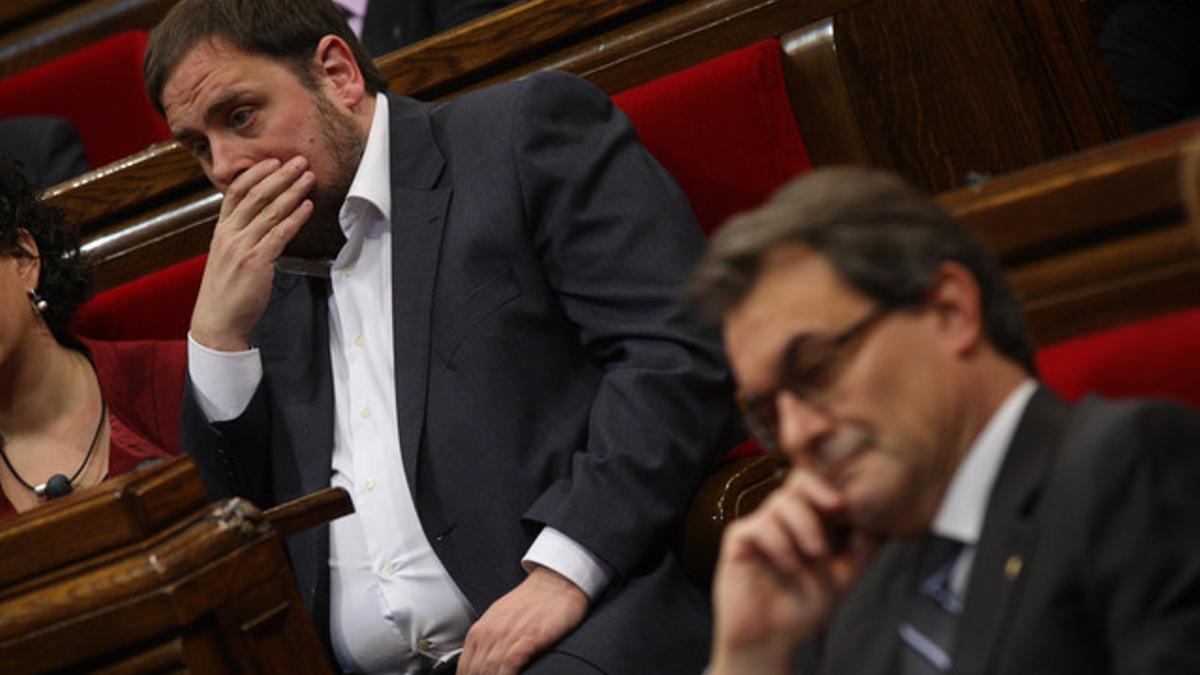 Oriol Junqueras y Artur Mas, en el Parlament.