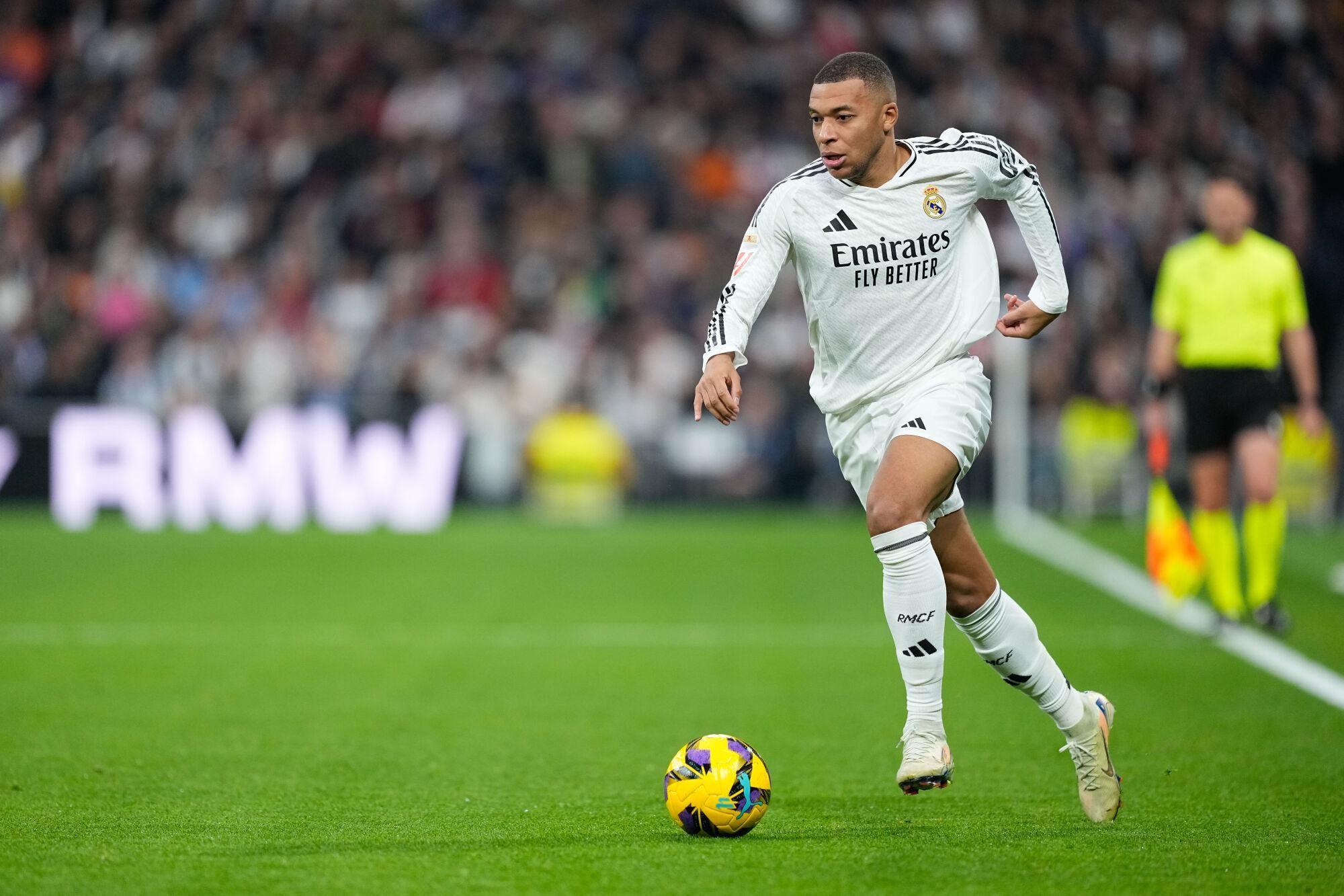 Kylian Mbappe of Real Madrid in action during the Spanish League, LaLiga EA Sports, football match played between Real Madrid and Sevilla FC at Santiago Bernabeu stadium on December 22, 2024, in Madrid, Spain. AFP7 22/12/2024 ONLY FOR USE IN SPAIN. Oscar J. Barroso / AFP7 / Europa Press;2024;SOCCER;SPAIN;SPORT;ZSOCCER;ZSPORT;Real Madrid v Sevilla FC - LaLiga EA Sports;