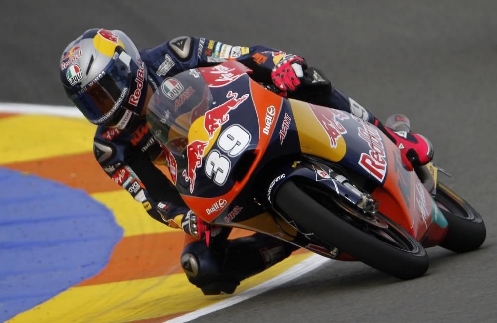 KTM Moto3 rider Luis Salom of Spain takes a ...