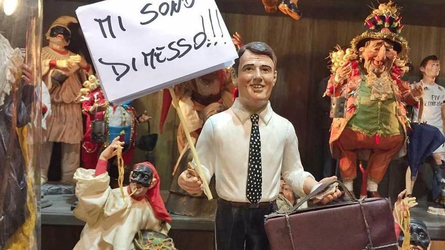 Figurilla navideña de Renzi con la pancarta &quot;¡Dimito!&quot;, en Nápoles.