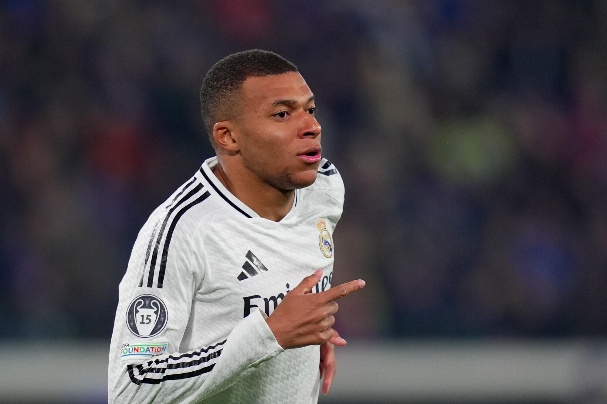 10 December 2024, Italy, Bergamo: Real Madrid's Kylian Mbappe celebrates scoring his side's first goal during the UEFA Champions League soccer match between Atalanta BC and Real Madrid at Gewiss Stadium. Photo: Spada/LaPresse via ZUMA Press/dpa Spada/LaPresse via ZUMA Press/dp / DPA 10/12/2024 ONLY FOR USE IN SPAIN. Spada/LaPresse via ZUMA Press/dp / DPA;Sports;soccer;football;sports;UEFA Champions League - Atalanta BC vs Real Madrid;