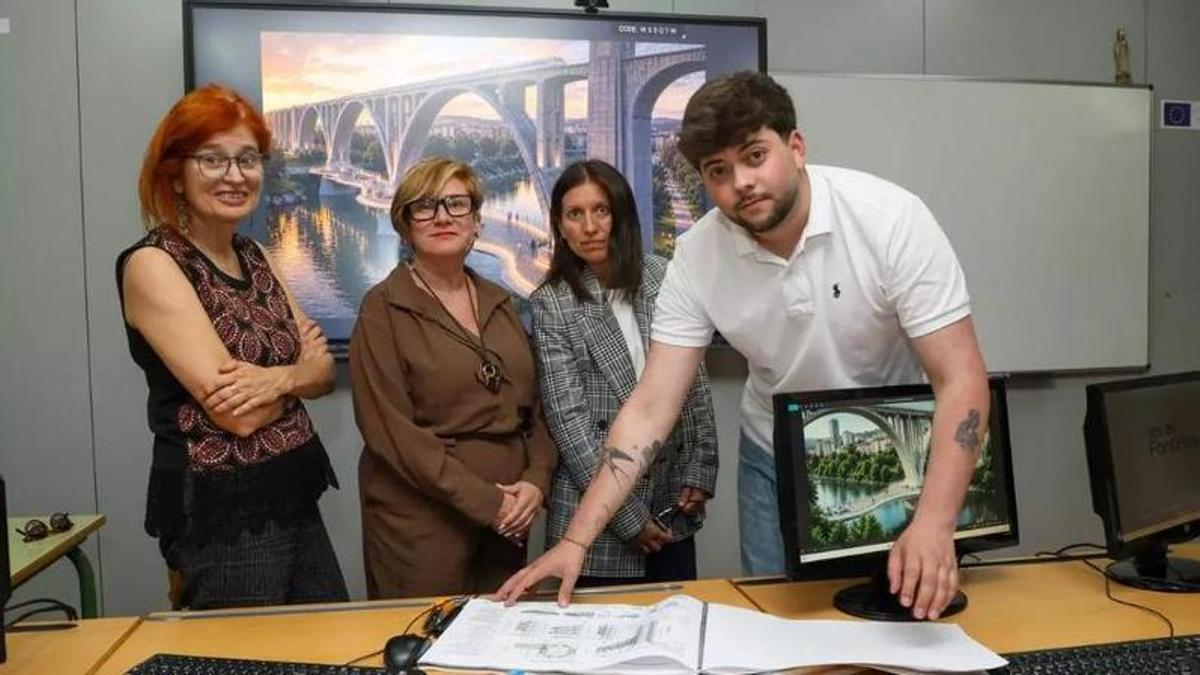 Raúl García, con infografías de su proyecto, junto a profesionales del IES As Fontiñas, donde estudia