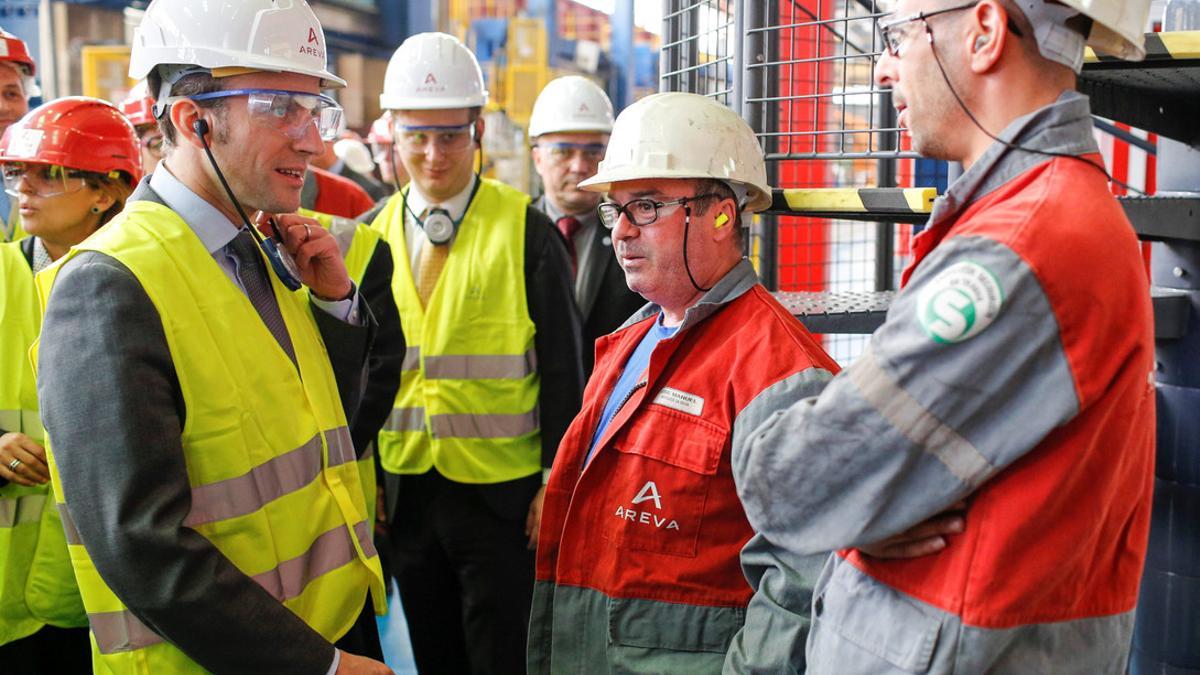 French Economy Minister Emmanuel Macron attends a visit at the Areva Creusot Forge site in Le Creusot