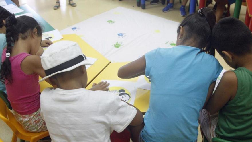 Alumnos en un centro de atención a la infancia de Murcia.  | ISRAEL SÁNCHEZ