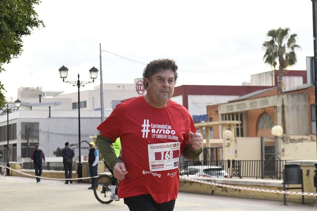 La XIII carrera solidaria Corriendo con Assido, en imágenes