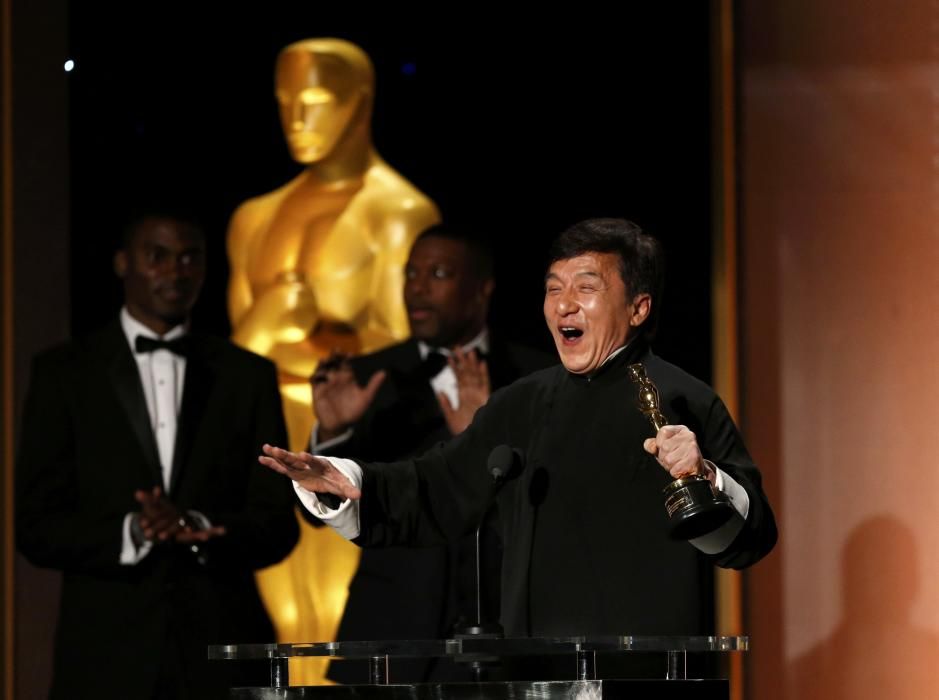 Actor Jackie Chan accepts his Honorary Award at ...