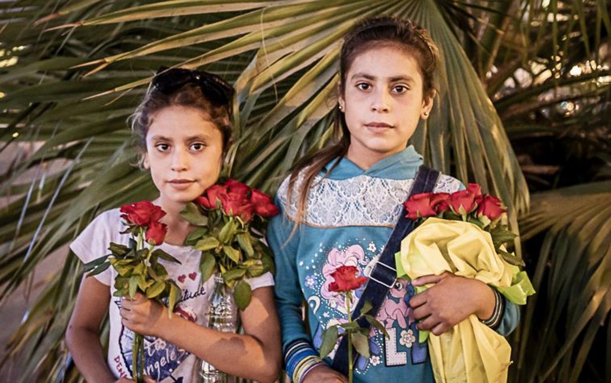 At right Ravaw 12 years old. At left Raf 9 years old, flower sellers during the night, child labour, syrian refugees, Corniche, Beirut, Lebanon