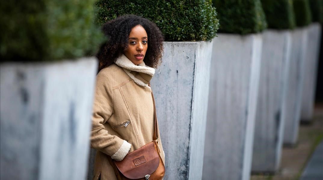 French ballet dancer Chloe Lopes Gomes poses for a picture outside the Deutsche Oper in Berlin  on January 7  2021  - Chloe Lopes Gomes  the first black dancer in the Berlin State Ballet  stands behind her allegations of racism at the company  which has launched an internal investigation into her complaints  (Photo by Odd ANDERSEN   AFP)