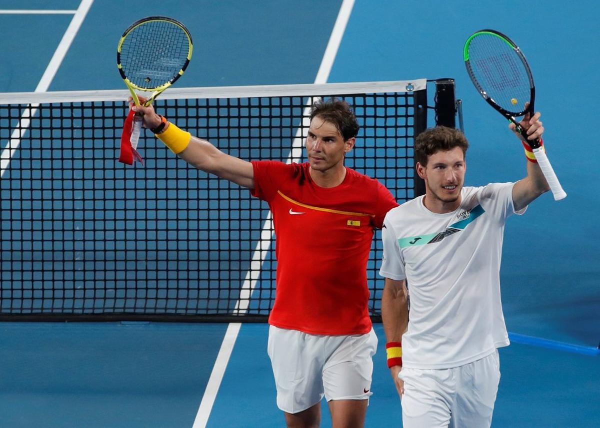 Tennis - ATP Cup - Ken Rosewall Arena, Sydney, Australia - January 10, 2020 Spain’s Rafael Nadal and Pablo Carreno Busta celebrate after winning their Quarter Final doubles match against Belgium’s Sander Gille and Joran Vliegen REUTERS/Ciro De Luca Tennis - ATP Cup - Ken Rosewall Arena, Sydney, Australia - January 10, 2020 Spain’s Rafael Nadal and Pablo Carreno Busta celebrate after winning their Quarter Final doubles match against Belgium’s Sander Gille and Joran Vliegen REUTERS/Ciro De Luca