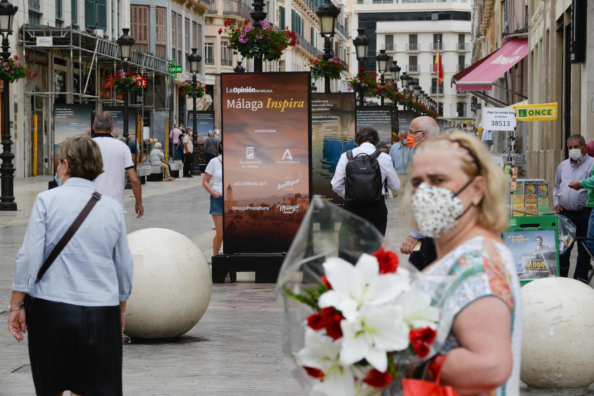 Exposición fotográfica 'Málaga Inspira', en la calle Larios