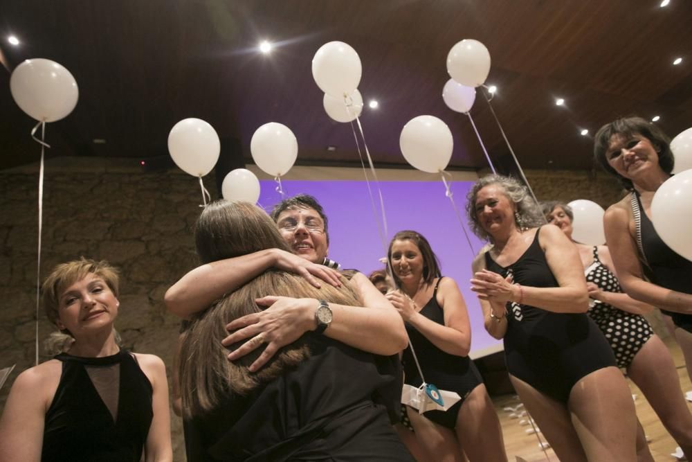 Desfile en el Auditorio de mujeres afectadas por cáncer de mama