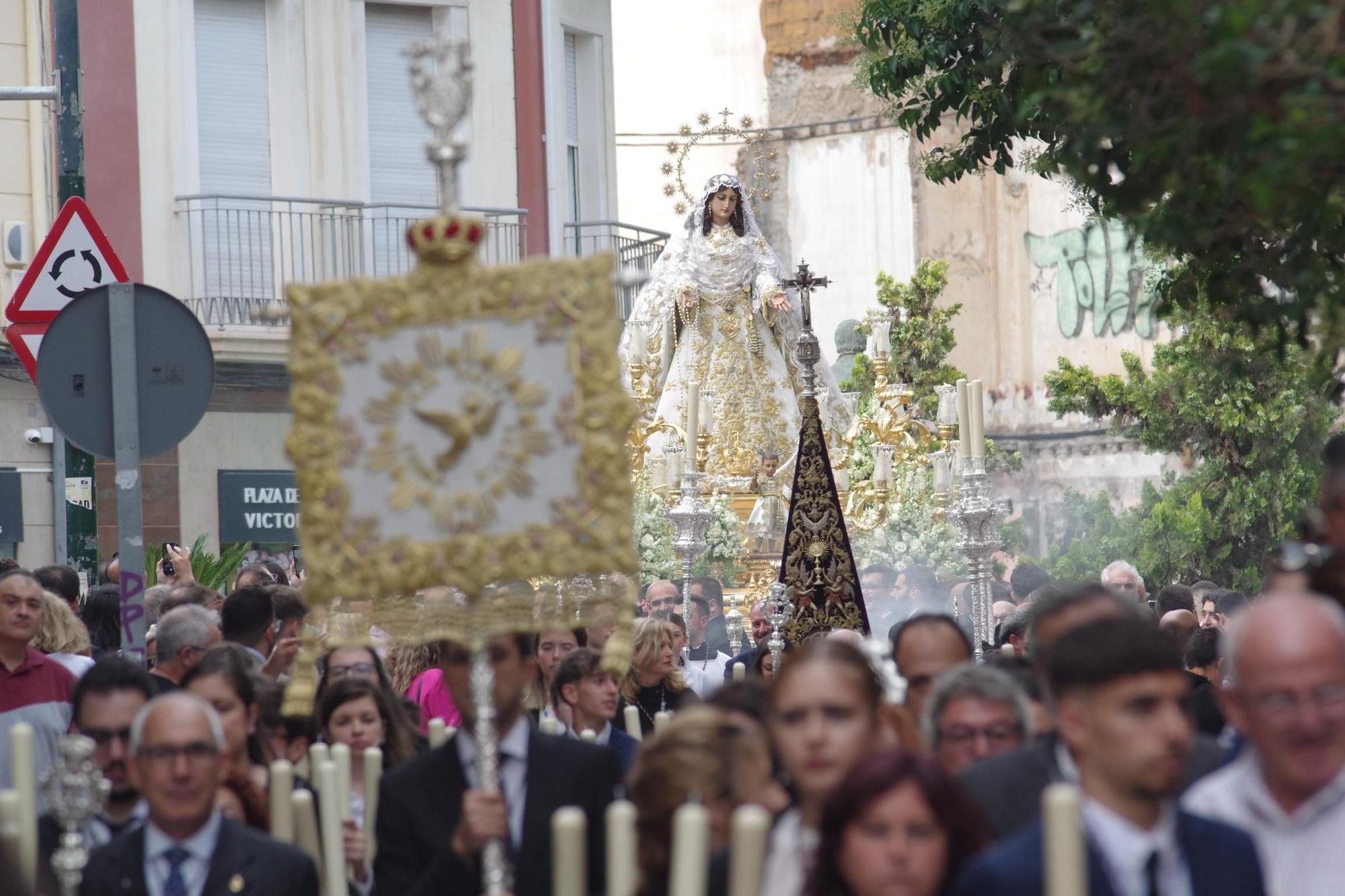 La procesión de la Virgen del Rocío por la Victoria y Lagunillas, en imágenes