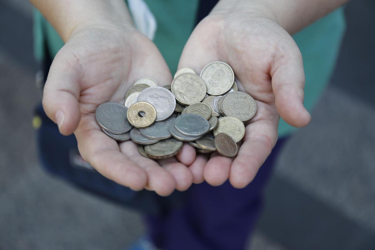 Pesetas.