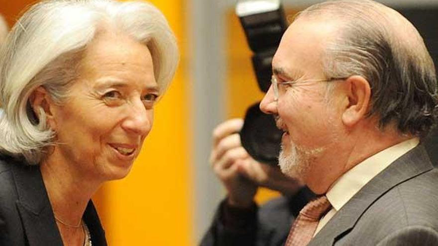 Solbes, con la ministra francesa Christine Lagarde.