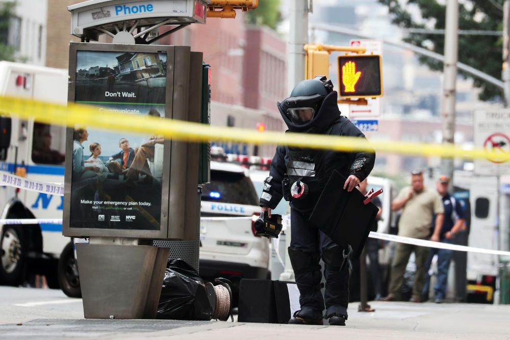 A NYPD Bomb Squad officer investigates ...