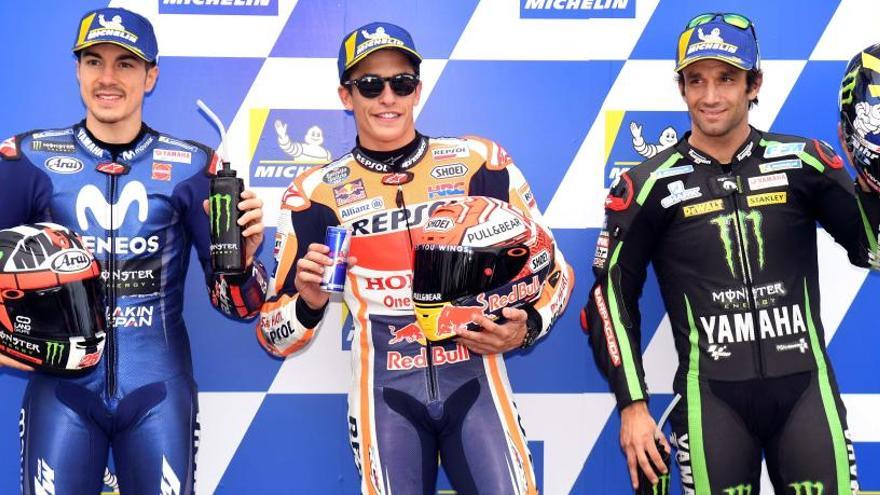 Márquez, flanqueado por Viñales y Zarco, segundo y tercero.