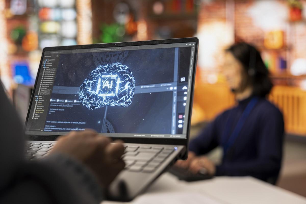 Call center worker uses AI technology on laptop to provide quick replies to common customer queries, close up. Customer service agent generates automated responses to clients using AI tech on notebook