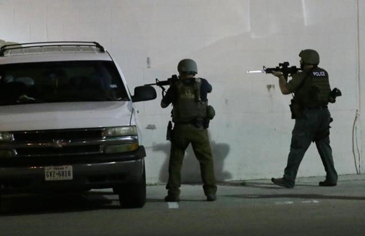 abertran34621965 police check a car early friday  july 8  2016  in dallas  sn160708102342