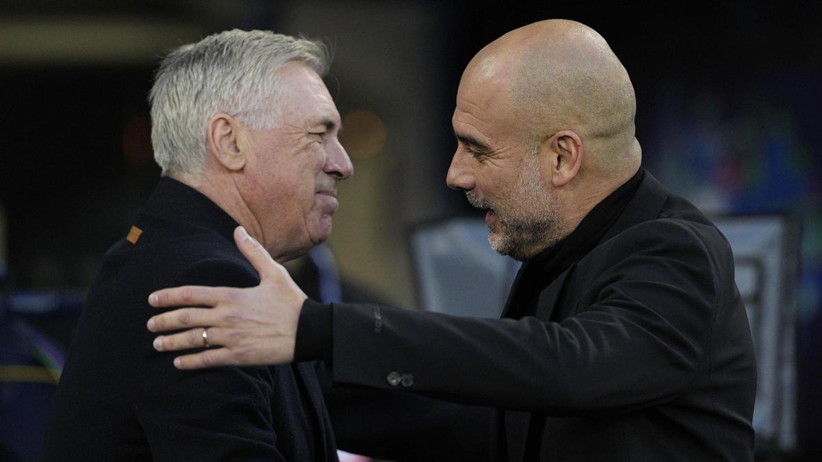 Manchester City's head coach Pep Guardiola, right, greets Real Madrid's head coach Carlo Ancelotti prior to the Champions League quarterfinal second leg soccer match between Manchester City and Real Madrid at the Etihad Stadium in Manchester, England, Wednesday, April 17, 2024. (AP Photo/Dave Shopland)