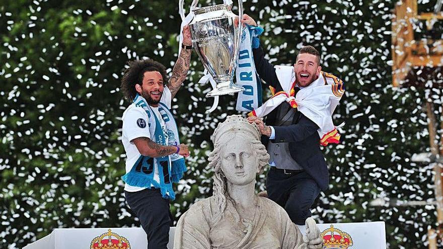 Marcelo y Ramos, tras ganar la última Champions.