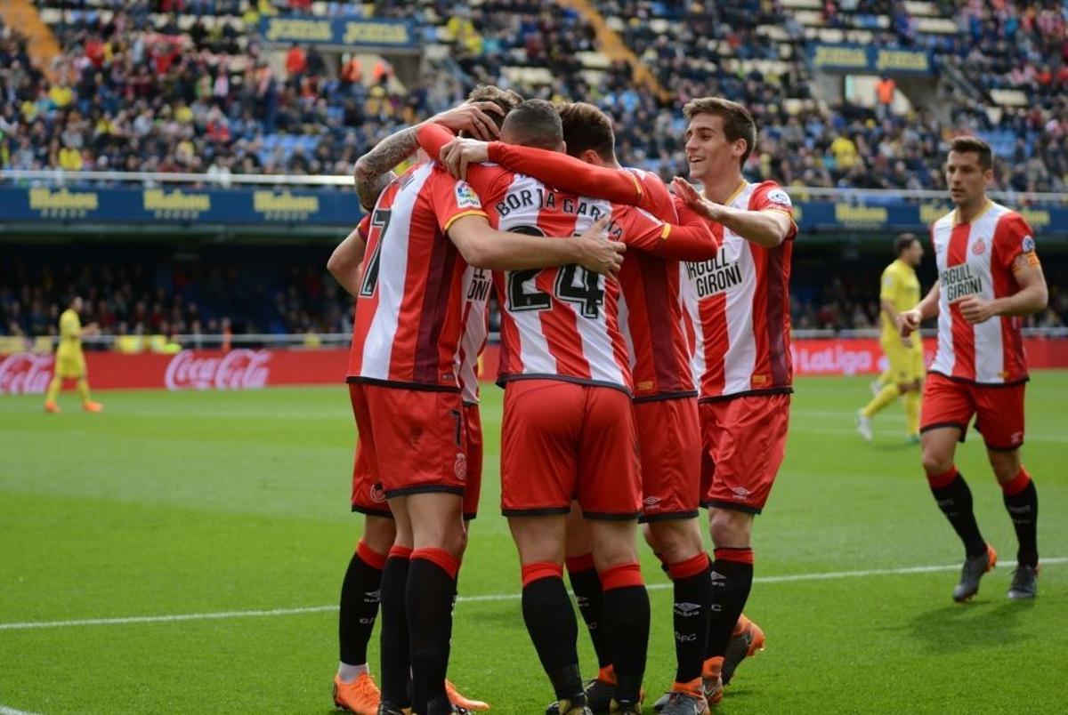 Els jugadors del Girona celebrant el triomf del 2017-18