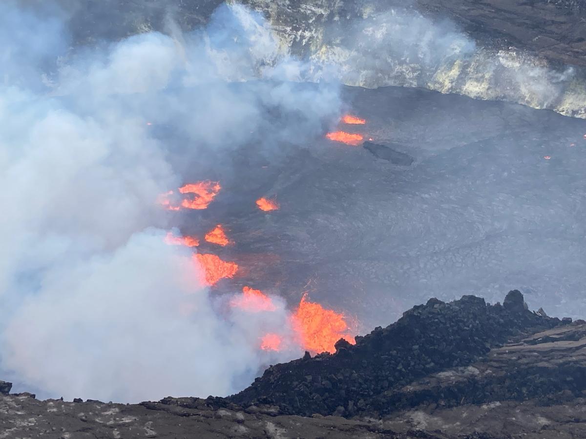 A rising lava lake is seen within Halemaumau crater during the eruption of Kilauea  volcano