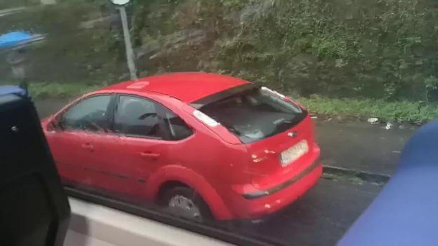 Temporal en Asturias: Inundación en la carretera de Figaredo