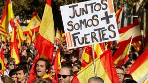 zentauroepp40459780 a man holds a banner which reads  together we are stronger  171008183702