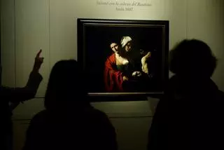El cuadro de Caravaggio 'Salomé con la cabeza del Bautista' se expone desde este martes en el Palacio Real