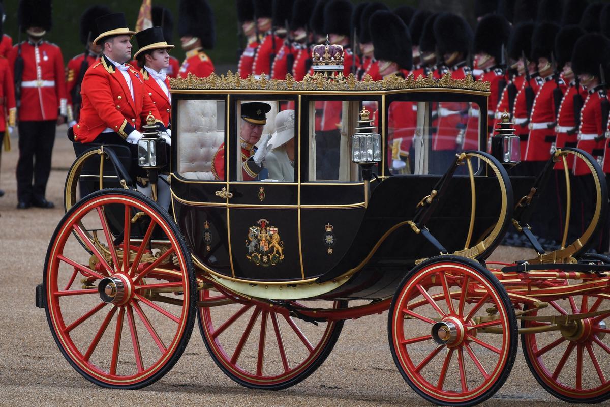 Britains King Charles and Queen Camilla arrive for the Trooping the Colour parade which honours his official birthday in London, Britain, June 15, 2024. REUTERS/Chris J. Ratcliffe