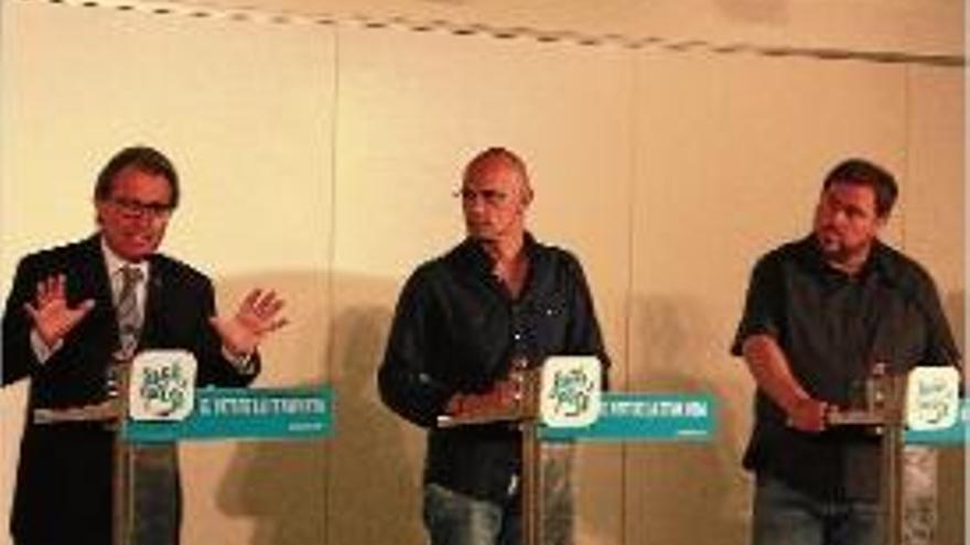 Artur Mas, Raül Romeva i Oriol Junqueras, en una roda de premsa.
