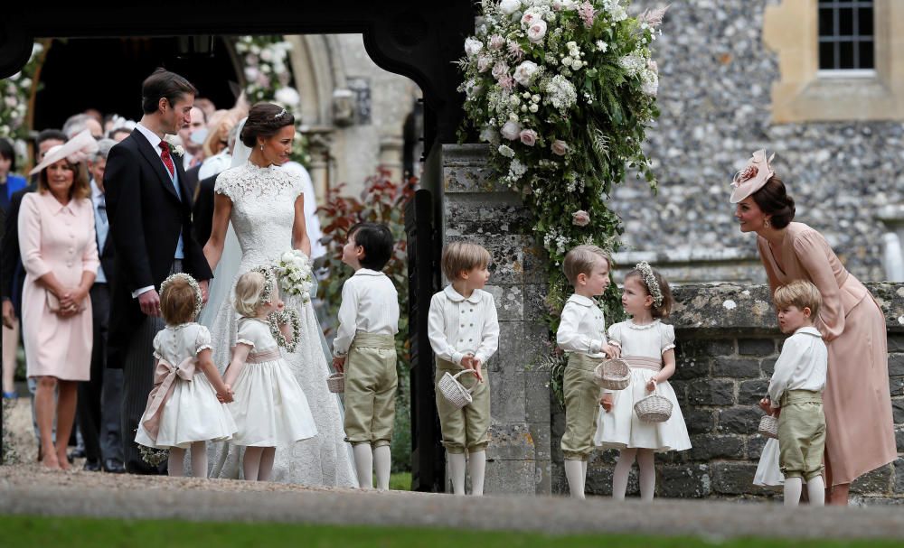 Britain's Catherine, Duchess of Cambridge stands ...