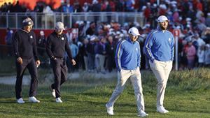 García y Rahm,  seguidos por Thomas y Spieth, en el inicio de su partida matinal