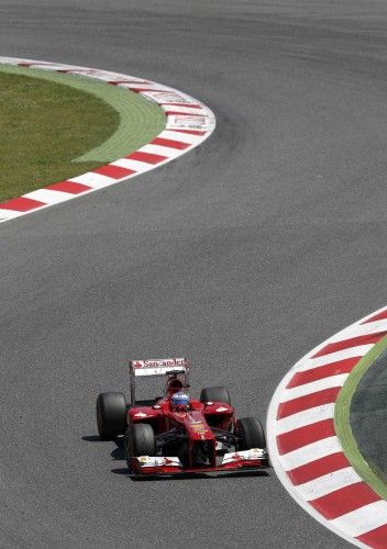 Ferrari Formula One driver Fernando Alonso of Spain leads the race during the Spanish F1 Grand Prix at the Circuit de Catalunya in Montmelo, near Barcelona