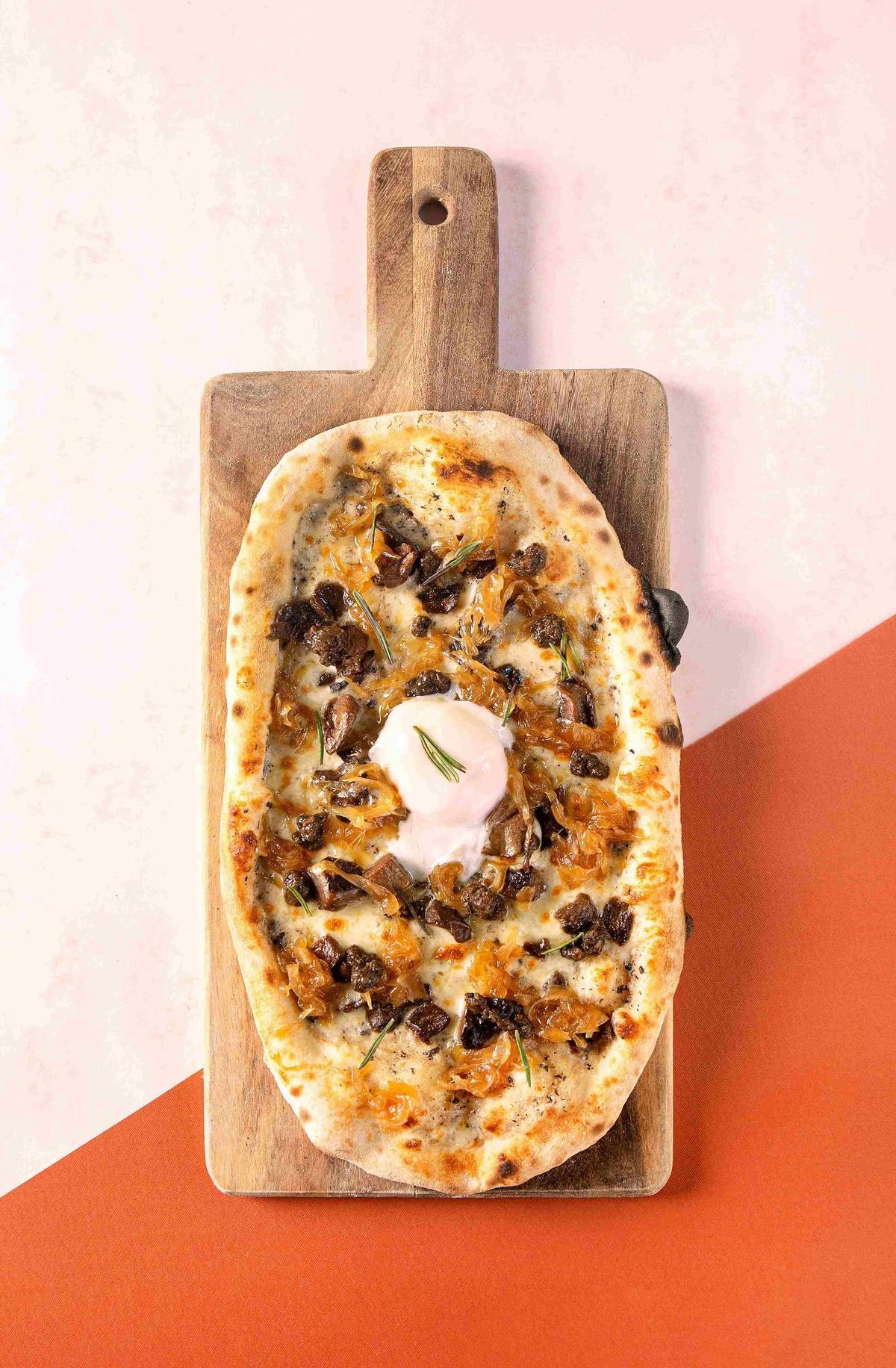 Pizza trufada en Superchulo.