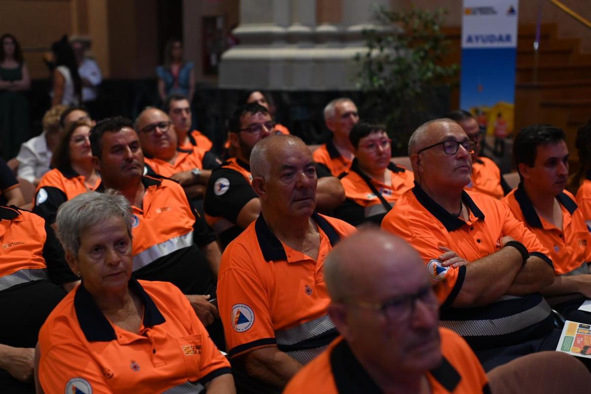Varios de los voluntarios, entre el público, este martes.