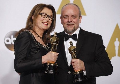 Hannon and Coulier pose with their award for best makeup and hairstlying for their work in "The Grand Budapest Hotel" during the 87th Academy Awards in Hollywood, California