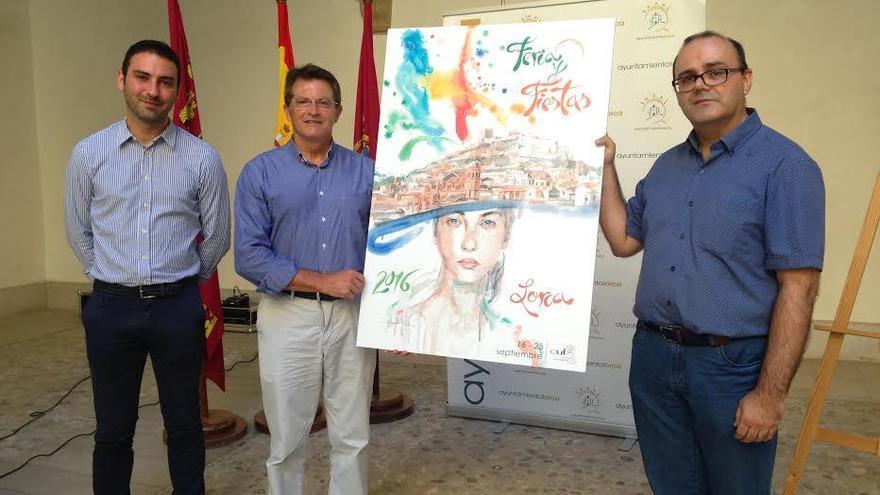 Francisco Jódar (i) y Salvador Caro (d) sostienen el cartel de la Feria y Fiestas de Lorca 2016.