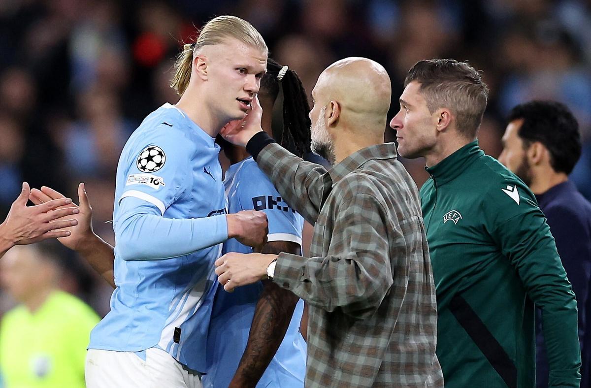 Guardiola con Haaland en el Manchester City-Real Madrid.