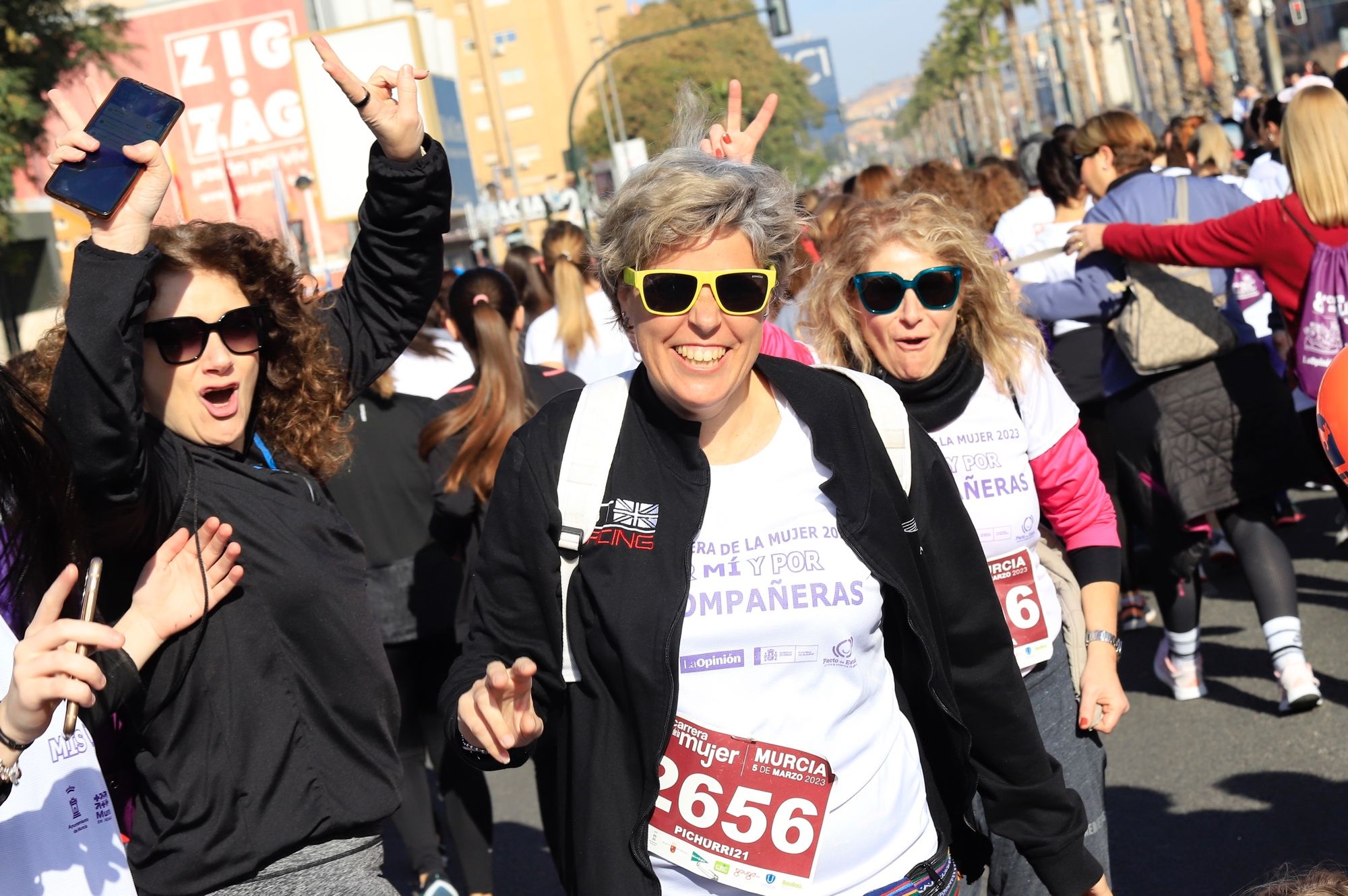 La salida y el recorrido de la Carrera de la Mujer 'inmortalizados' en imágenes