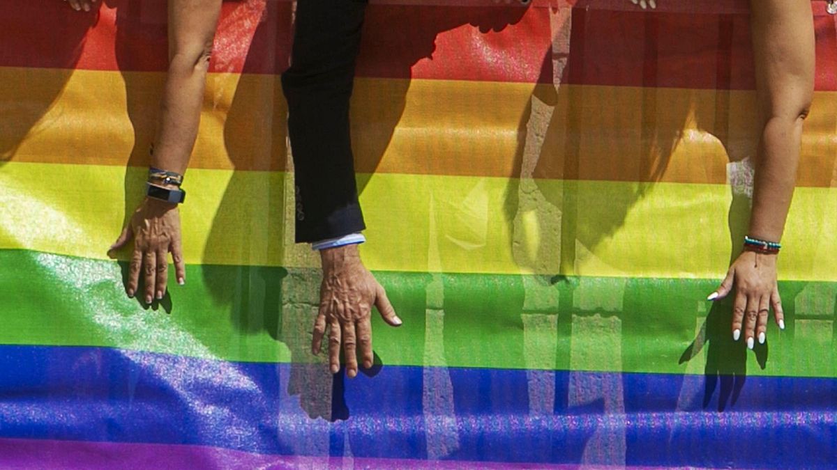 The rainbow flag is the most recognized symbol of the LGTBI struggle. The image is taken on a Pride Day on the balcony of the Alicante Town Hall. The rainbow flag is the most recognized symbol of the LGTBI struggle. The image is taken on a Pride Day on the balcony of the Alicante Town Hall.