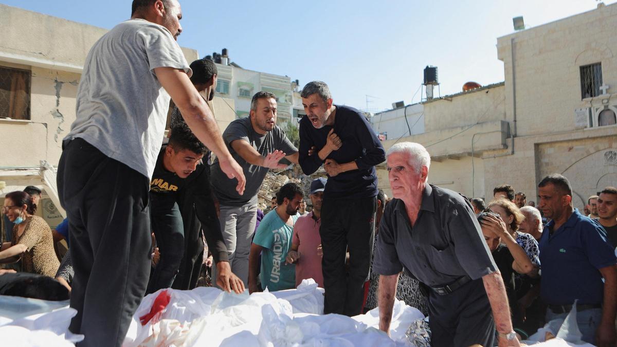 Worshippers attend a funeral at Greek Orthodox Saint Porphyrius Church, in Gaza City