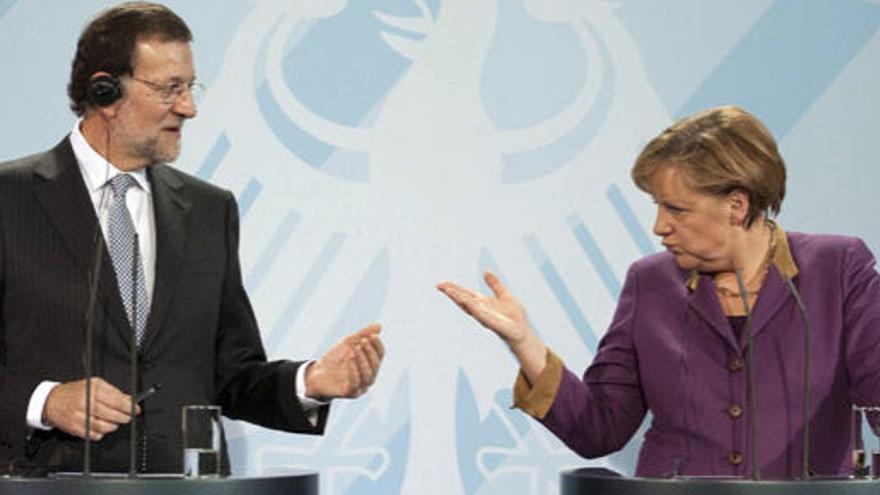 Rajoy y Merkel, en la anterior cumbre, en enero.