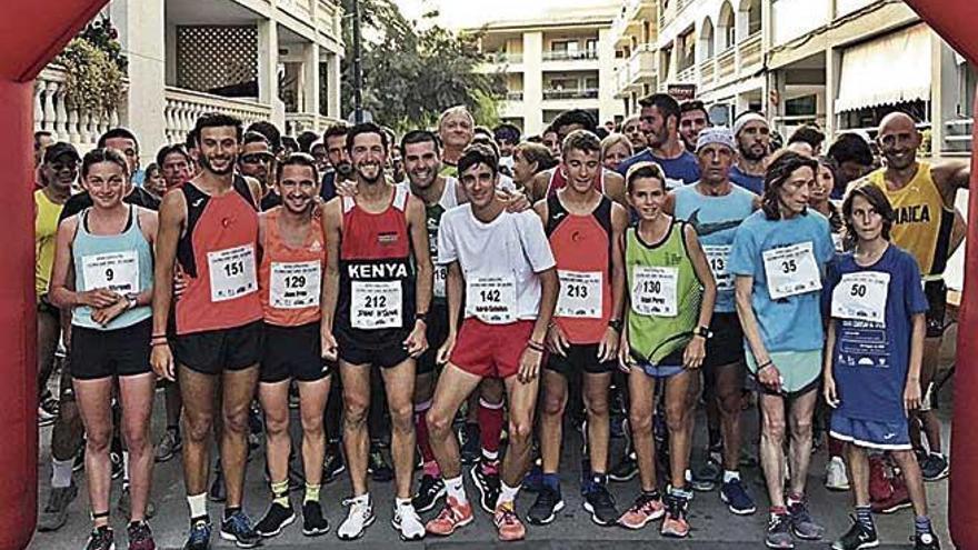 Los atletas esperan la salida en la ColÃ²nia de Sant Jordi.