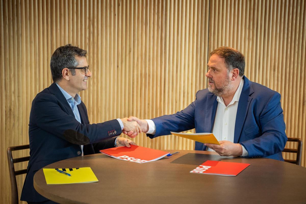 El ministro Félix Bolaños y el presidente de ERC, Oriol Junqueras.